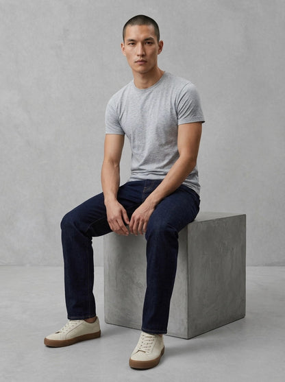 Edwin Regular Tapered Jeans porté assis, Blue Rinsed